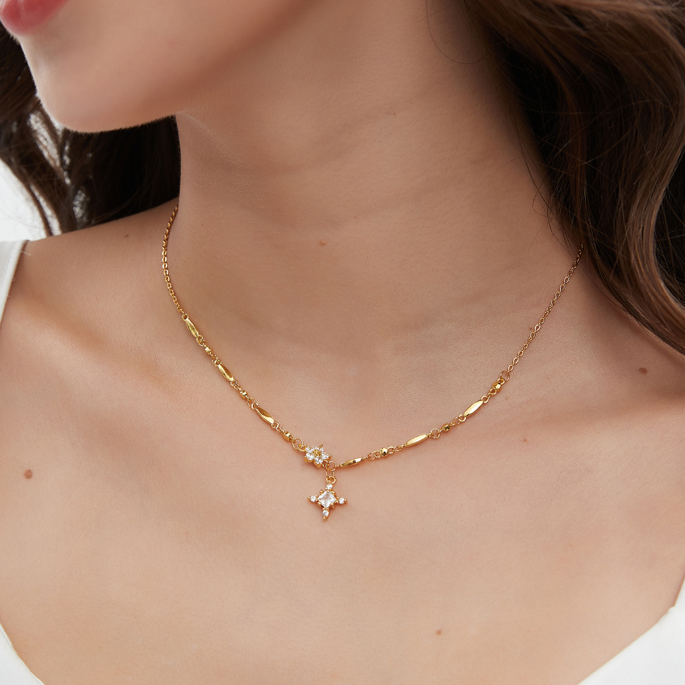 HEAVENLY CROSS NECKLACE
