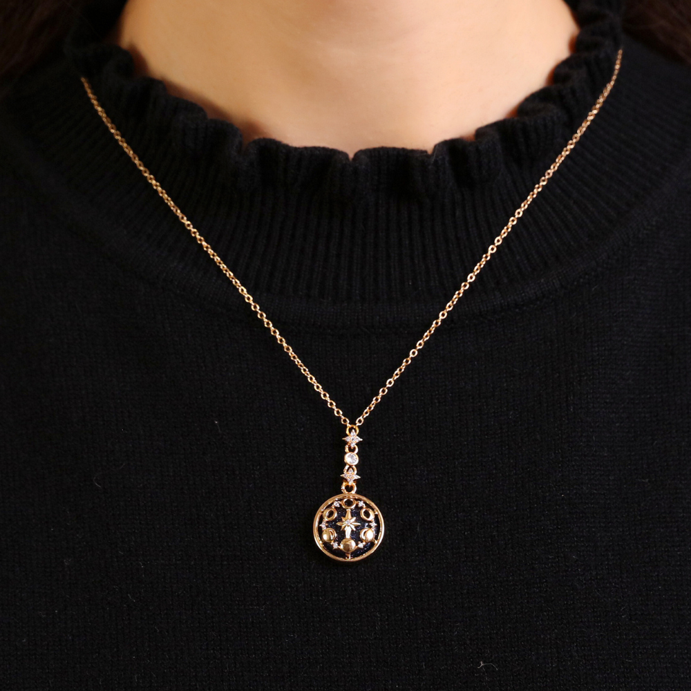 MOON FACES NECKLACE