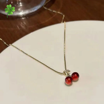 CHERRY CHARM NECKLACE