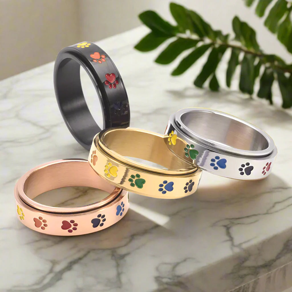 Spinning Anti-Stress Paw Ring – Stainless Steel with Rainbow Paws