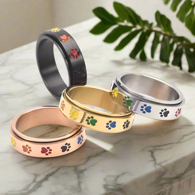 Spinning Anti-Stress Paw Ring – Stainless Steel with Rainbow Paws