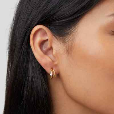 Diamond touch gold earrings